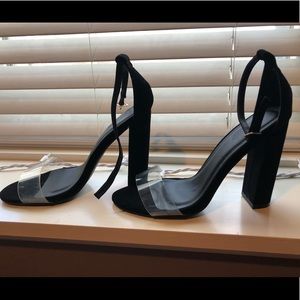 Black heels with clear toe strap